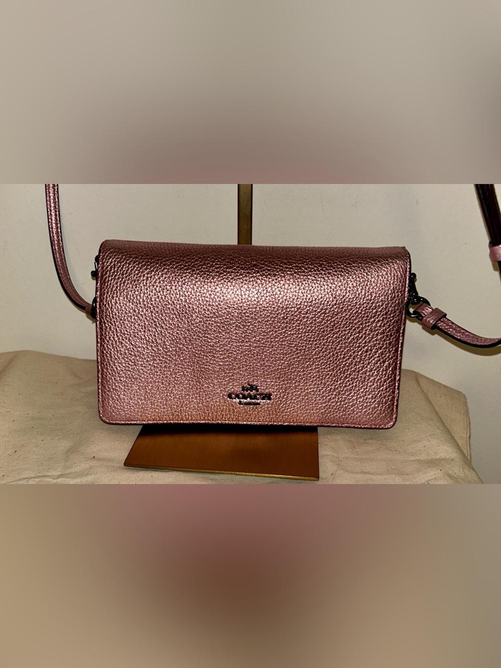 Coach Hayden Foldover Crossbody Clutch. textured metallic pink leather